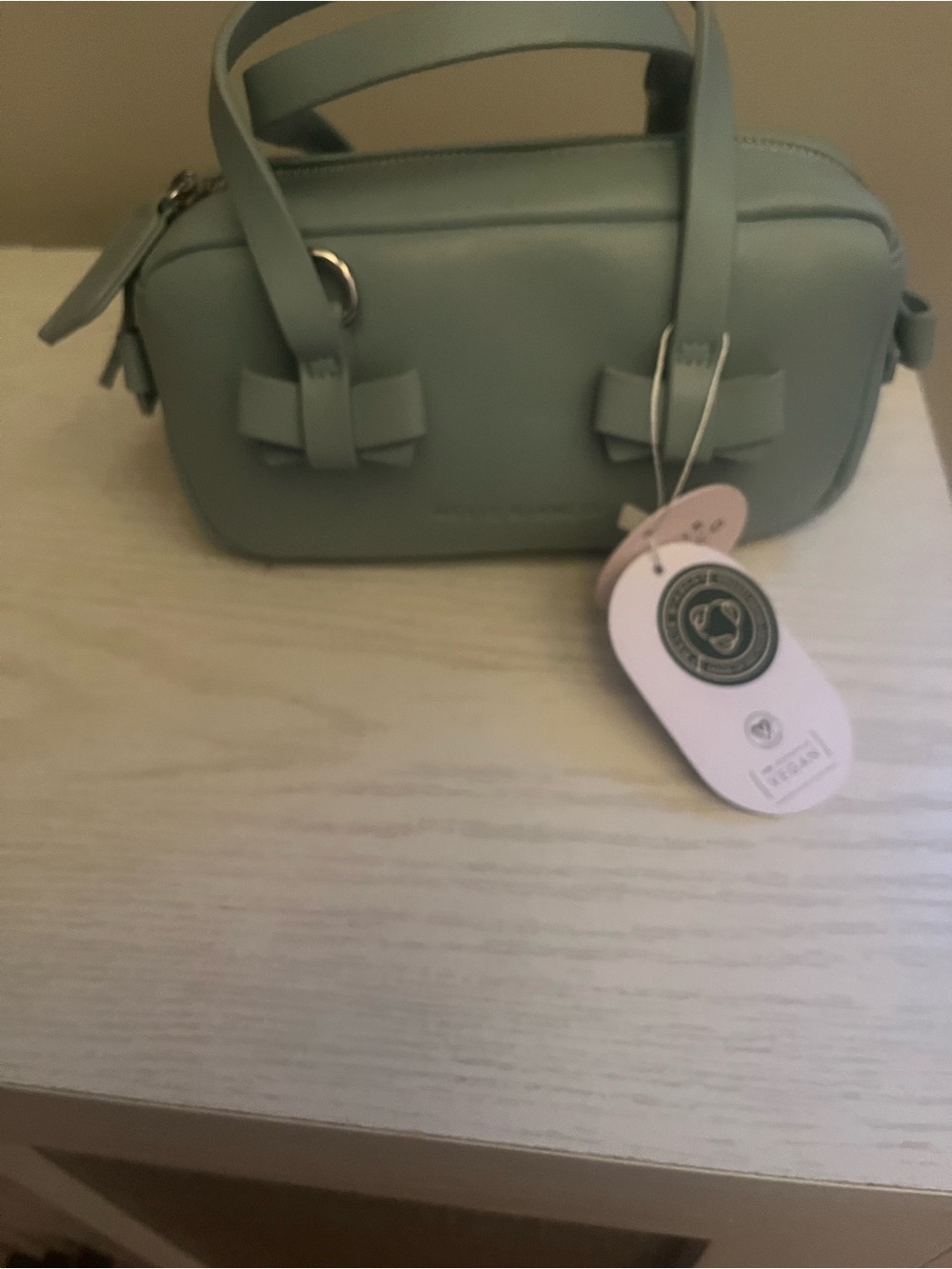 Melie Bianco Mini Crossbody Bag with Bow Accent